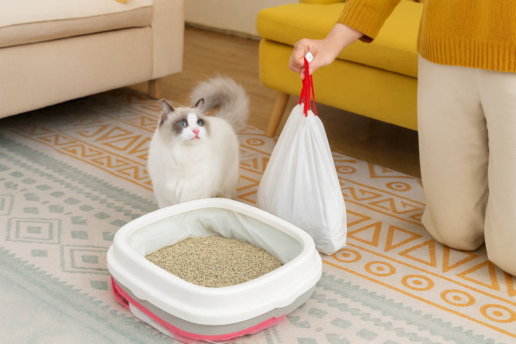 Sac à litière pour chat main